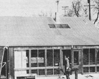 The Hammond house (note drum wall, shutters, and skylight).